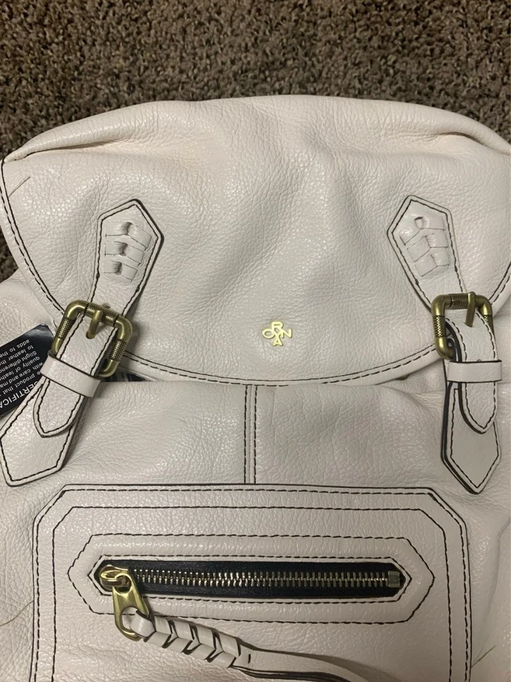 orYANY White Leather Backpack with Front Zip Pocket and Buckle Detail - Picture 2 of 9
